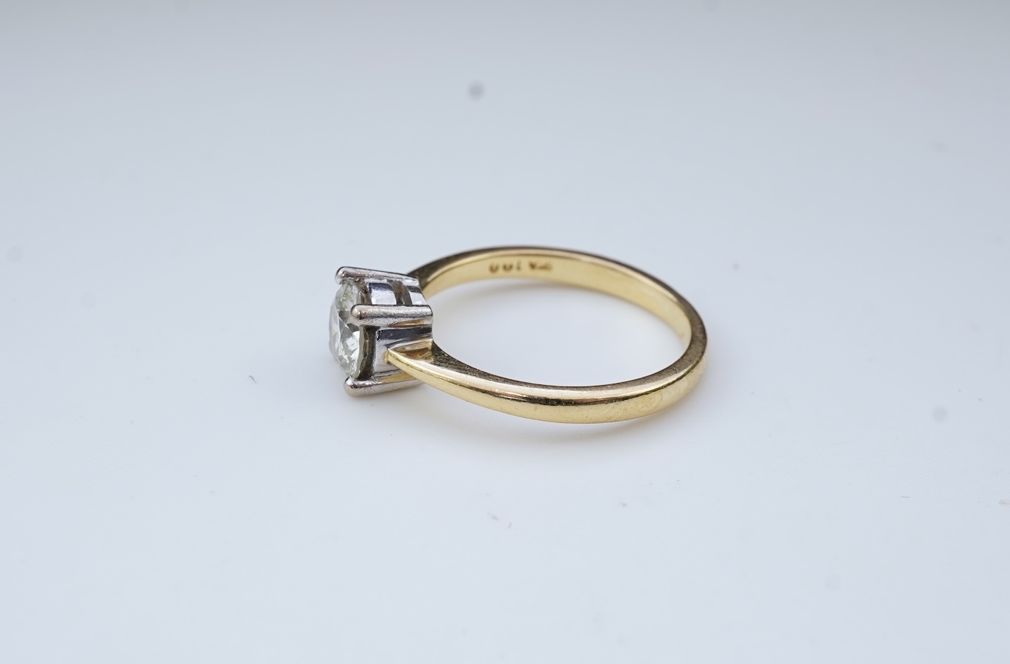A diamond solitaire ring